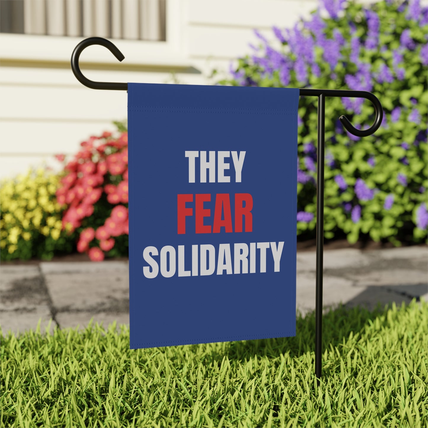 They Fear Solidarity – Garden Banner