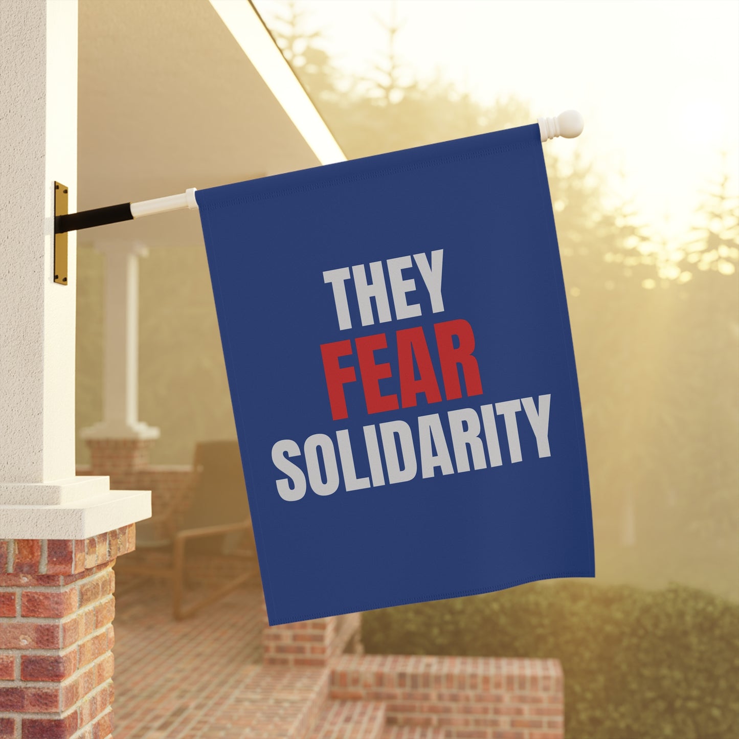 They Fear Solidarity – Garden Banner