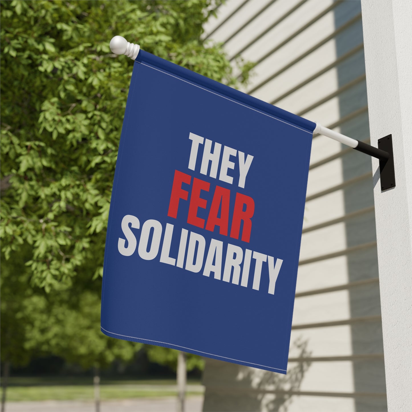 They Fear Solidarity – Garden Banner
